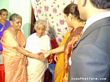 My grandmother giving my hand to his mother